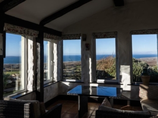 Sun lounge with uninterrupted views of sunset over Galway Bay