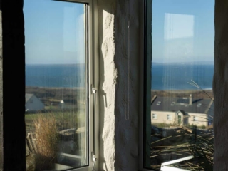 Sun lounge with uninterrupted views of sunset over Galway Bay