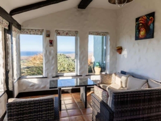 Sun lounge with uninterrupted views of sunset over Galway Bay